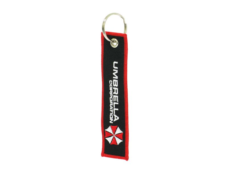 Брелок из ткани "Umbrella corporation" с вышивкой 3х13 см